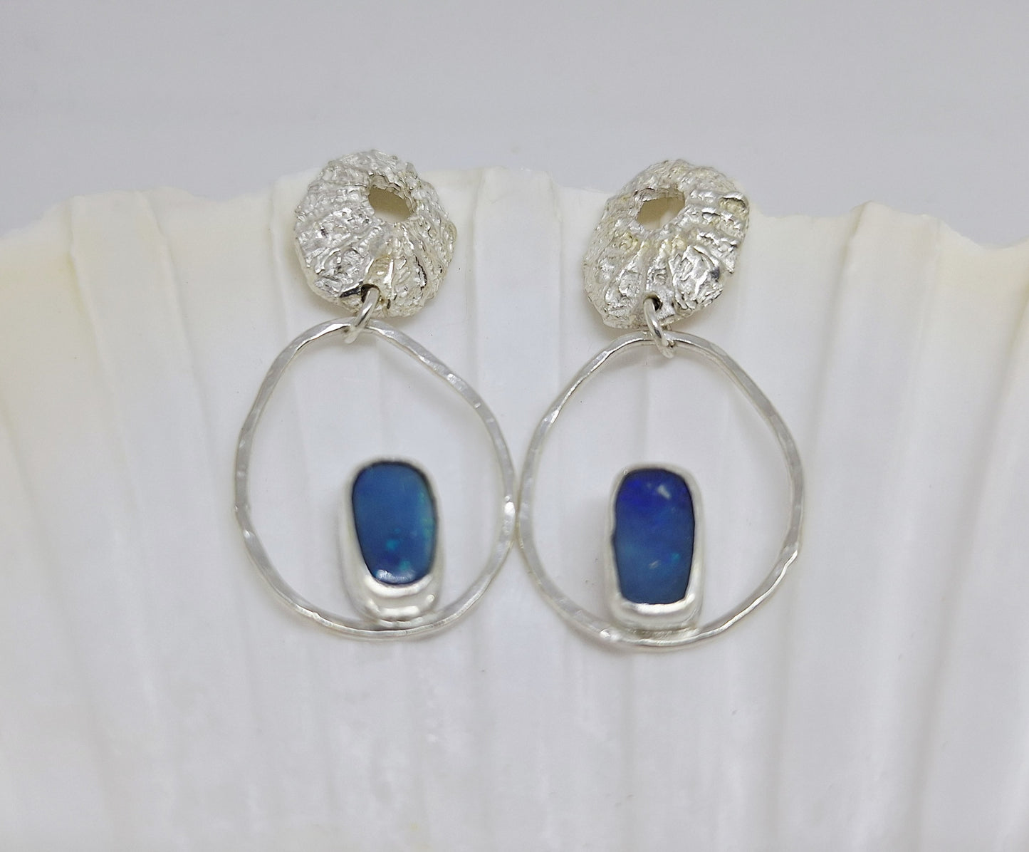 Limpet, pebble and opal stud earrings