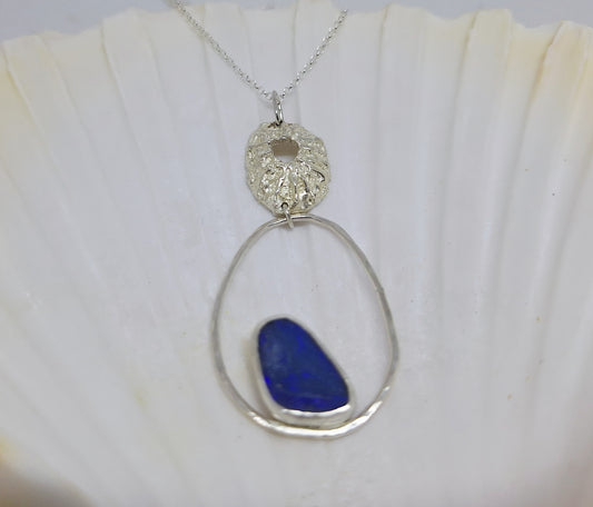 Limpet, pebble and opal pendant