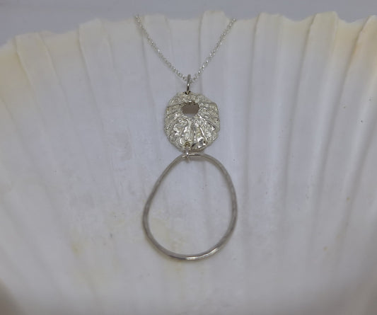 Limpet and pebble pendant