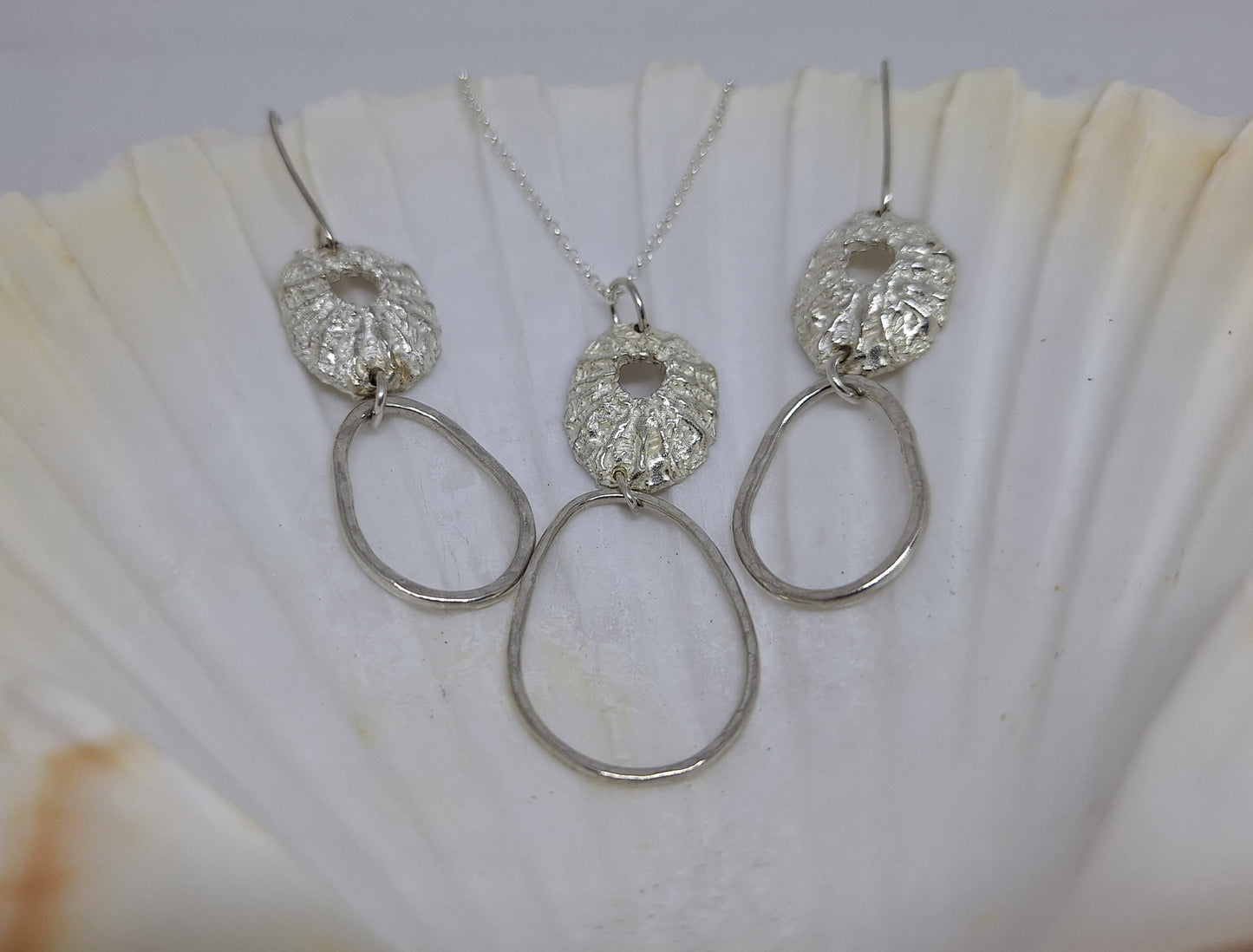 Limpet and pebble drop earrings