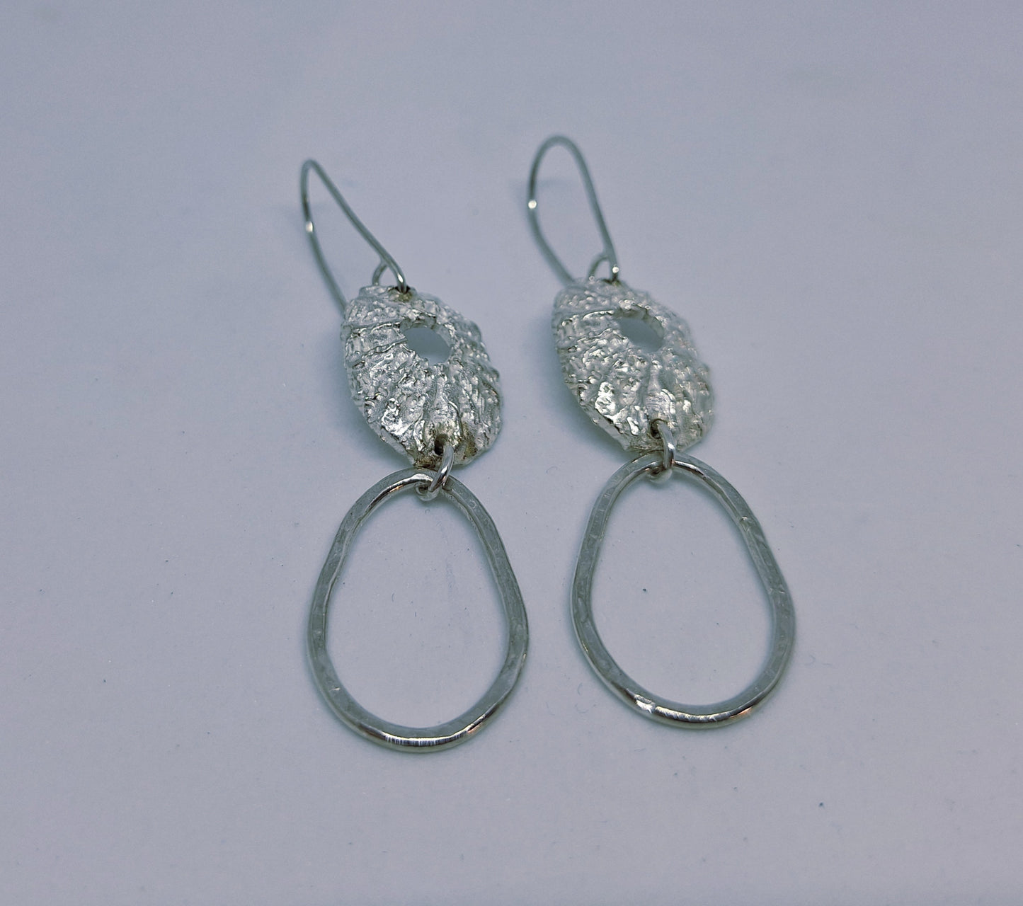 Limpet and pebble drop earrings